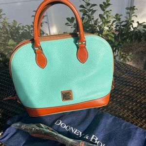 Dooney & Bourke purse mint and brown. Never used but tags removed.